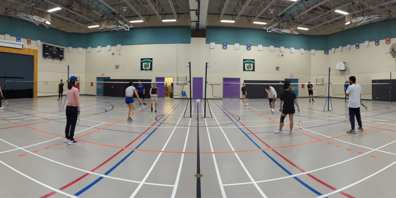 people playing badminton